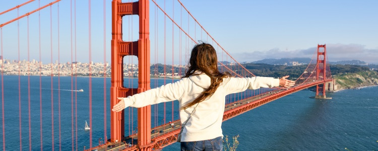 girl enjoying the view from the Golden Gate Bridge